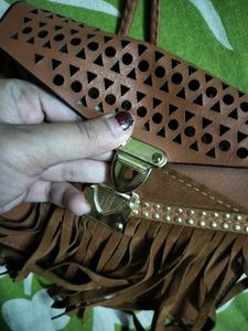 BROWN TASSLED SLING BAG