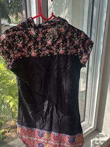 Floral Print Top bust is 18 inches