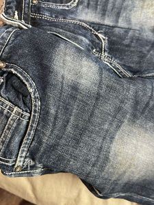 Ripped Blue Denim Jeans