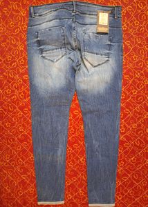 Women&#39;s Blue Rigged/Distressed Jeans