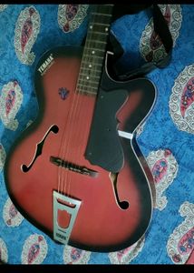 YEMAHA Guitar with Pick Holder And Bag.