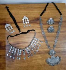Two Pairs Of Necklace And Earrings