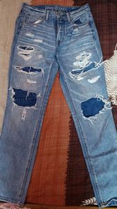 new size 32 ripped jeans ( never used)