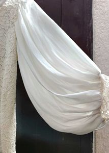 white top with heavy balloon sleeves