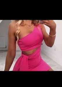 One off shoulder, neon pink Short jumpsuit