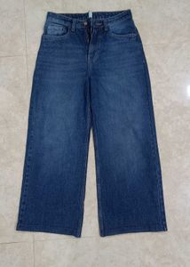 Buy Blue Wide Leg Jeans Get a free crop Top .