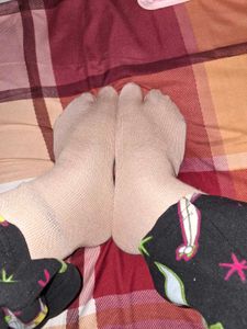 Black and skin Socks (preloved) each @99rs