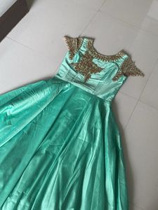 Beautiful Pista Colour Gown With Sleeves Pattern