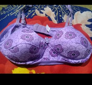 UNUSED PURPLE BRA. PADDED. SIZE 34