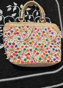 Elegant Gold-Tone Handbag