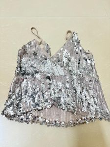 eye-catching sequin cami top from ZARA Woman.
