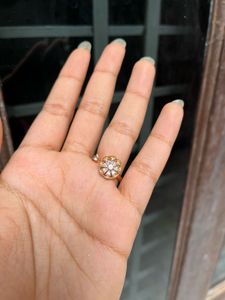 Elegant Gold Rotating Flower Ring