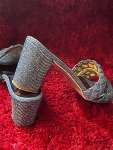 Iridescent silver kitten heels