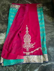 Red &amp;firoja colour saree.