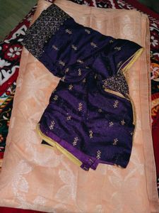 Crossandra saree with purple heavy blouse
