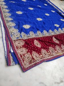 pink velvet border blue Dimond stone work saree