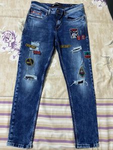 Distressed Denim Jeans with Patches