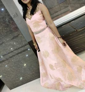 Elegant Peach And Golden Gown