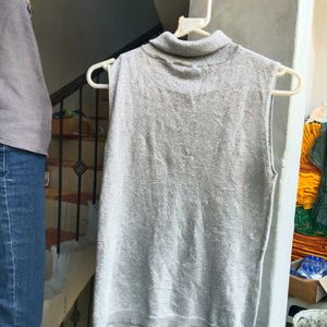 Sleeveless Silver Top with turtle neck