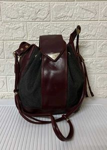 Yves Saint Laurent Drawstring Bag ( Authentic)