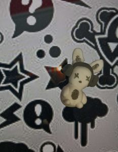 A Cute Bunny Charm 🐰 Wearing Headphones