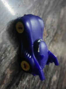 Purple Figure Toy