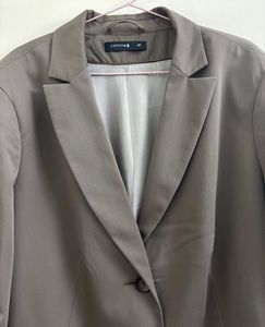 COMMA’ SLIQUE BOW-DETAILED BLAZER