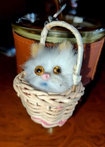 &#34;Fluffy Cat Keyring in Woven Basket&#34;