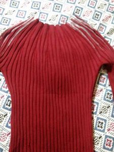 Red embellished long sleeve top