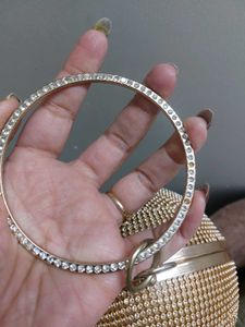 Round Studded Handheld Clutch With Metal Sling