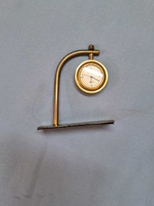 DECORATIVE PIECE WITH CLOCK