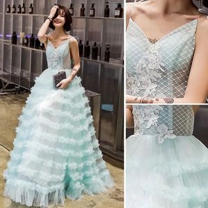 Elegant Mint Green Ruffled Gown