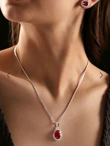 Rubans Rhodium Plated CZ- Studded Pendant Earrings