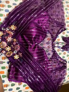 Celebrity Purple Netted Saree With Designer Blouse