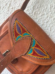 Leather Sling Bag With Hand Work On It