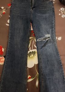 Ripped Flare Jeans