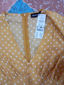 Polka Dot Peplum Top