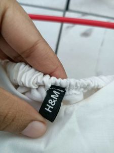 White Sleeveless Top