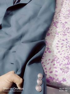 expensive park avanue branded suit