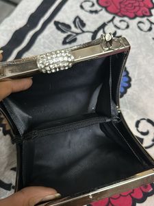silver fancy hand bag all metal