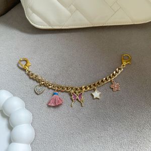 pink butterfly bag charm