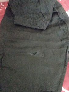 dark green kurti and pant set.