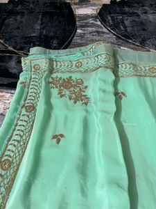 Elegant fluorescent green Saree with blouse