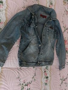 brand new slightly ripped denim jacket