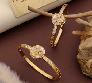 Gold Tone Flower Bangle Set