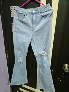 Women Ripped Flare Leg Jeans