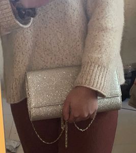 Sparkling Silver Clutch cum sling with chain👛