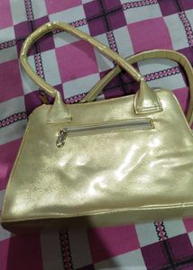 A Used Gold Colour Purse Ok In Condition