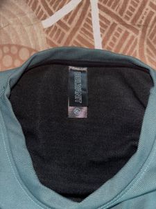 Green long-sleeved shirt