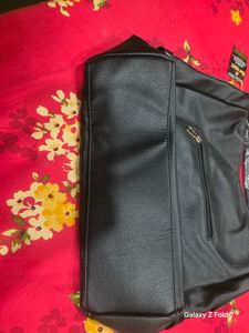 Chic Black Handbag very spacious and soft